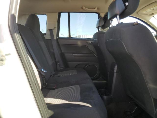 Photo 10 from auction – 2014 JEEP COMPASS with VIN 1C4NJCBA7ED925630