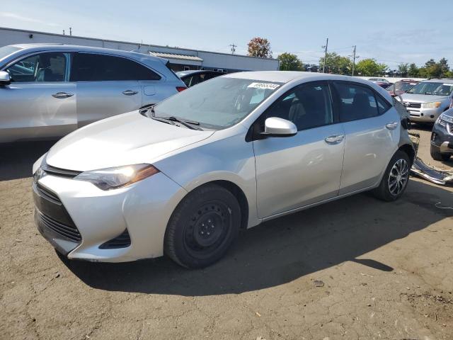TOYOTA COROLLA L 2017 with VIN 5YFBURHE5HP593440 - Photo from auction