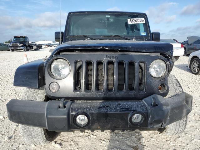Photo 5 from auction – 2014 JEEP WRANGLER U with VIN 1C4BJWEG4EL254699