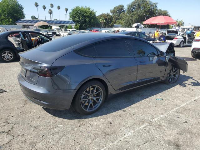 Photo 3 from auction – 2022 TESLA MODEL 3 with VIN 5YJ3E1EBXNF267671
