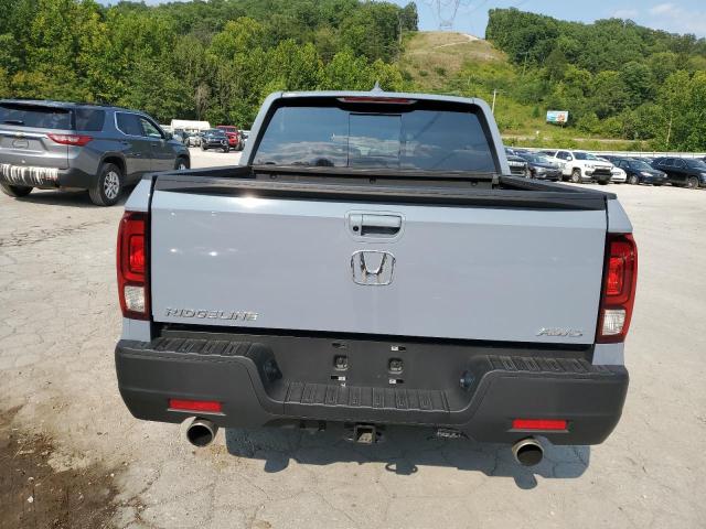 Photo 6 from auction – 2023 HONDA RIDGELINE with VIN 5FPYK3F50PB057271