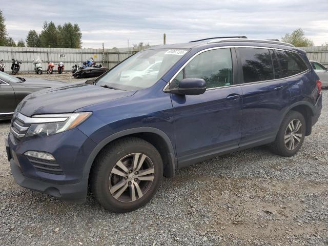 HONDA PILOT EXL 2018 with VIN 5FNYF6H61JB062832 - Photo from auction