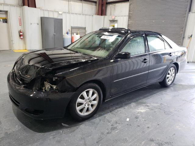 Photo 1 from auction – 2002 TOYOTA CAMRY LE with VIN JTDBF30K020002554