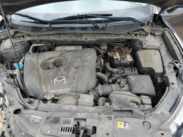 Photo 12 from auction – 2014 MAZDA CX-5 SPORT with VIN JM3KE2BE4E0329359