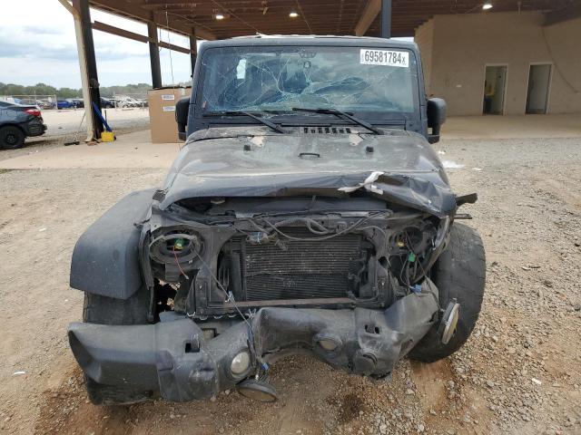 Photo 5 from auction – 2014 JEEP WRANGLER U with VIN 1C4BJWDG9EL247717