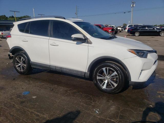 Photo 4 from auction – 2017 TOYOTA RAV4 XLE with VIN JTMWFREV3HJ103422