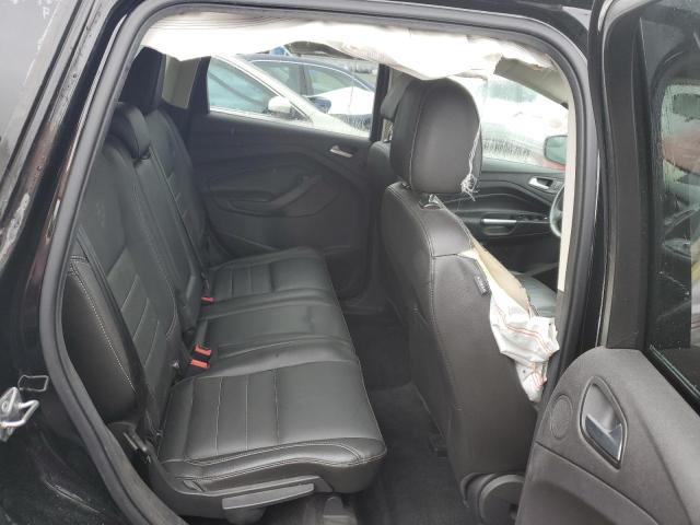 Photo 10 from auction – 2016 FORD ESCAPE SE with VIN 1FMCU9GX2GUA59137
