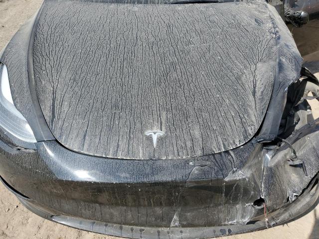 Photo 11 from auction – 2023 TESLA MODEL Y with VIN 7SAYGDEE2PF685966