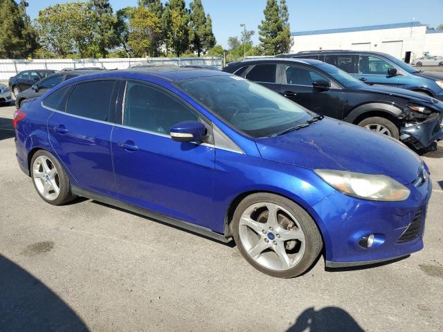 Photo 4 from auction – 2014 FORD FOCUS TITA with VIN 1FADP3J2XEL149719