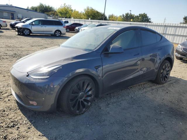 TESLA MODEL Y 2023 with VIN 7SAYGDEF4PF912339 - Photo from auction