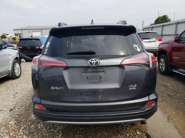 Photo 6 from auction – 2018 TOYOTA RAV 4 with VIN 2T3RFREV1JW844933