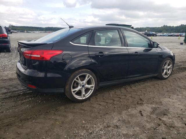 Photo 3 from auction – 2016 FORD FOCUS TITA with VIN 1FADP3J29GL248762