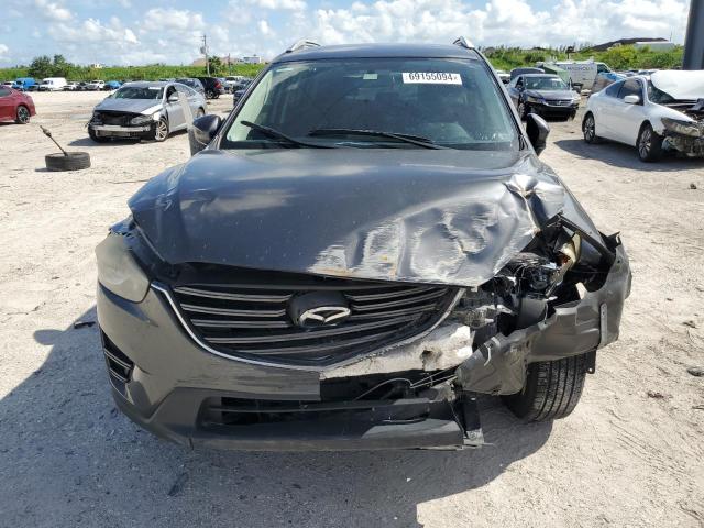 Photo 5 from auction – 2016 MAZDA CX-5 SPORT with VIN JM3KE2BY9G0716356