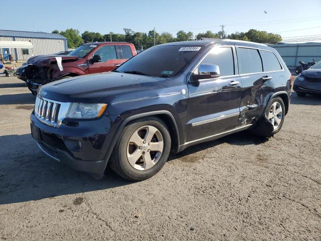 JEEP GRAND CHER 2011 with VIN 1J4RR6GT7BC697985 - Photo from auction