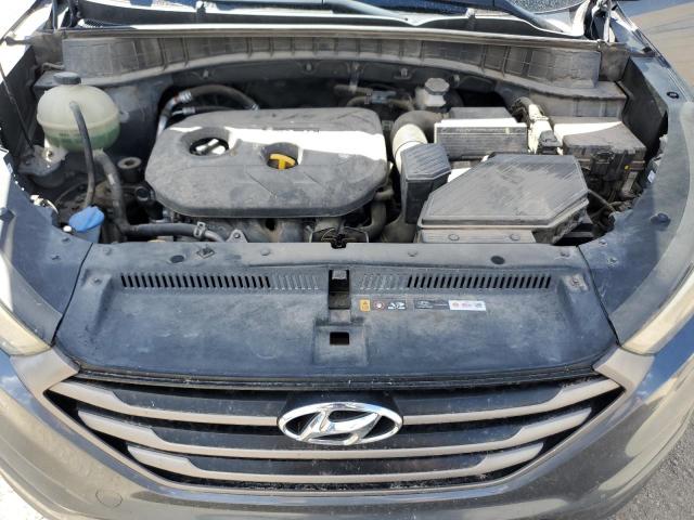 Photo 12 from auction – 2016 HYUNDAI TUCSON SE with VIN KM8J23A47GU238024