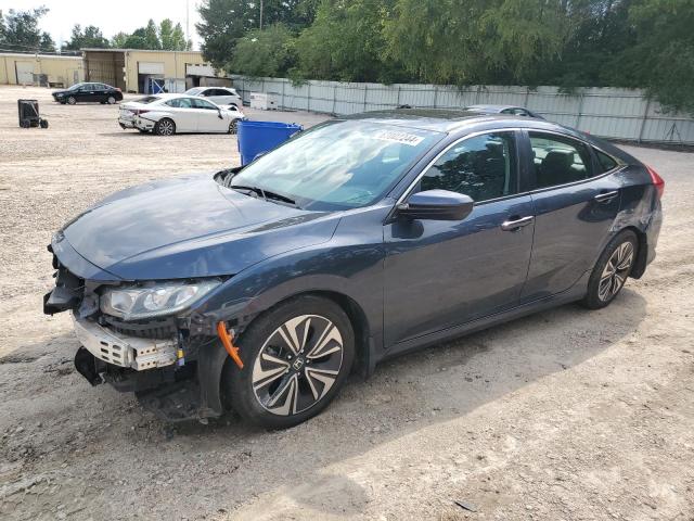 HONDA CIVIC EXL 2017 with VIN 19XFC1F79HE012386 - Photo from auction