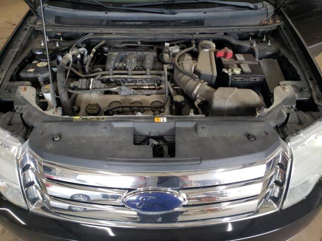 Photo 12 from auction – 2008 FORD TAURUS X S with VIN 1FMDK02W58GA13807