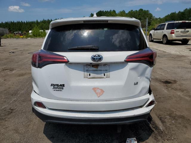 Photo 6 from auction – 2018 TOYOTA RAV4 LE with VIN 2T3ZFREV0JW447150