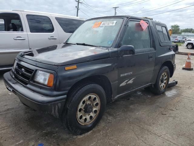 SUZUKI SIDEKICK J 1996 with VIN 2S3TA02C0T6409050 - Photo from auction
