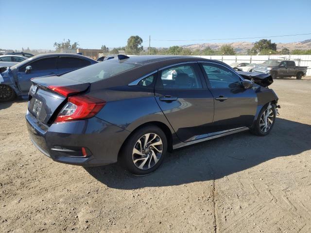 Photo 3 from auction – 2018 HONDA CIVIC EX with VIN 19XFC2F74JE203080