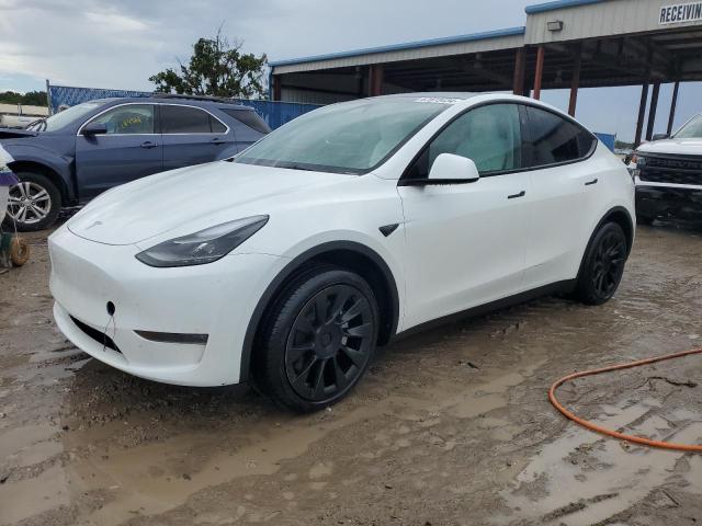 TESLA MODEL Y 2023 with VIN 7SAYGDEE1PA164458 - Photo from auction