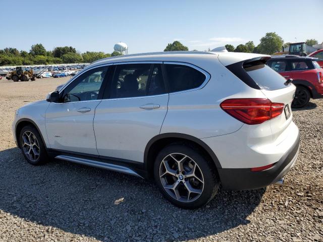 Photo 2 from auction – 2017 BMW X1 XDRIVE2 with VIN WBXHT3C35H5F80416