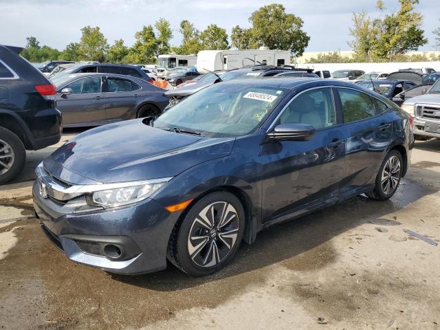 HONDA CIVIC EX 2018 with VIN JHMFC1F42JX013616 - Photo from auction