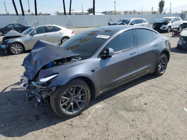 TESLA MODEL 3 2022 with VIN 5YJ3E1EBXNF267671 - Photo from auction