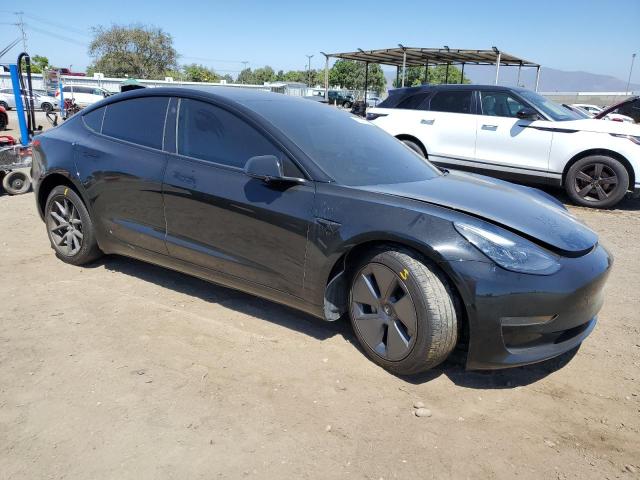 Снимка 4 от търг – 2021 TESLA MODEL 3 с VIN 5YJ3E1EA0MF005485