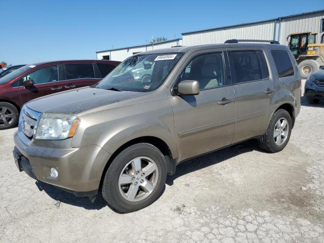 HONDA PILOT EXLN 2011 with VIN 5FNYF4H77BB042129 - Photo from auction