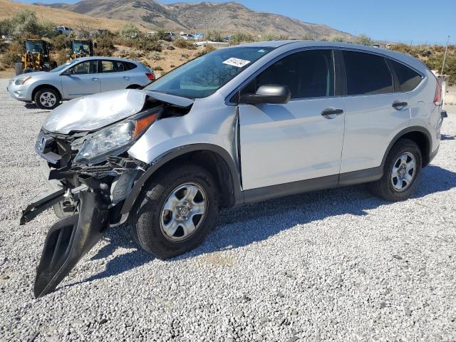 HONDA CR-V LX 2014 with VIN 2HKRM4H31EH616138 - Photo from auction