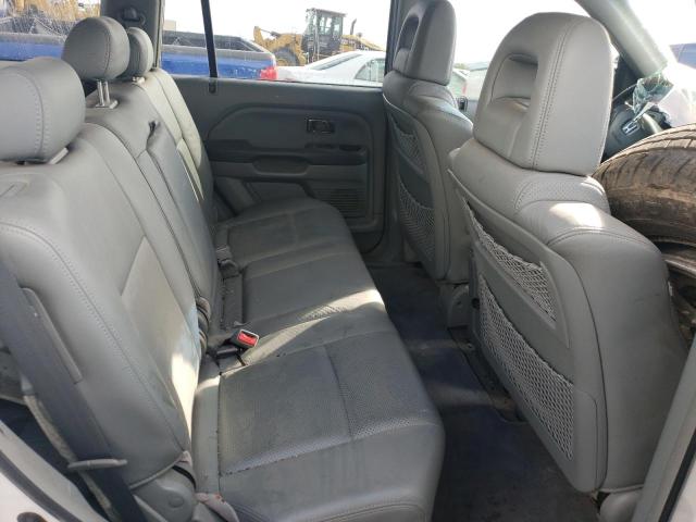 Photo 11 from auction – 2004 HONDA PILOT EXL with VIN 2HKYF18504H609959