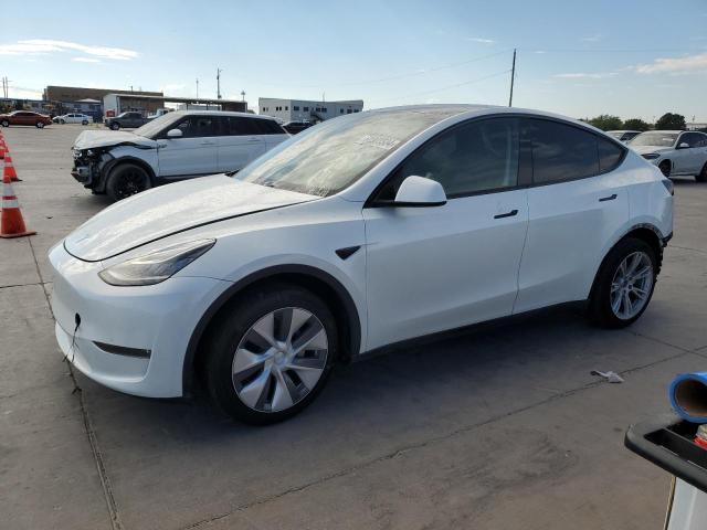 TESLA MODEL Y 2023 with VIN 7SAYGDEE0PA097139 - Photo from auction