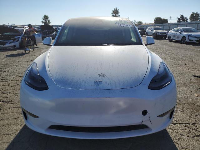 Photo 5 from auction – 2023 TESLA MODEL Y with VIN 7SAYGDED8PF959565