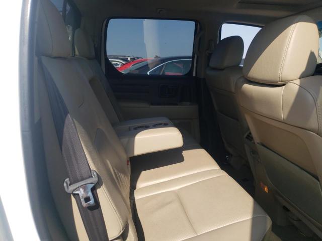 Photo 10 from auction – 2009 HONDA RIDGELINE with VIN 5FPYK16589B100942