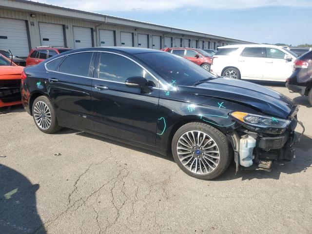 Photo 4 from auction – 2018 FORD FUSION TIT with VIN 3FA6P0D98JR234313