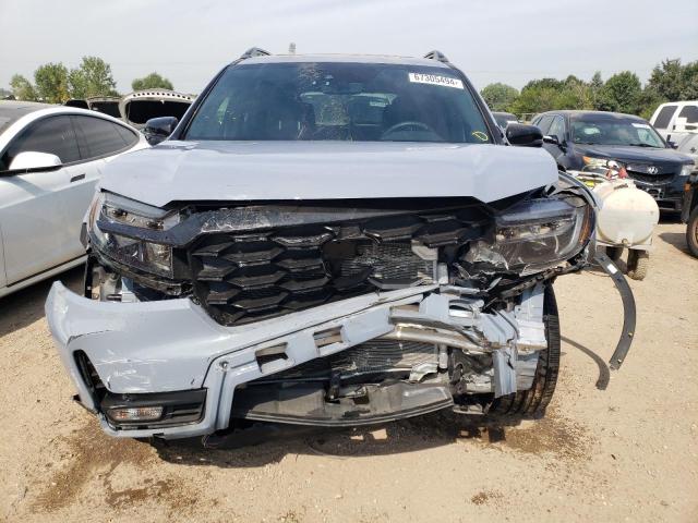 Photo 5 from auction – 2022 HONDA PASSPORT E with VIN 5FNYF8H08NB014807