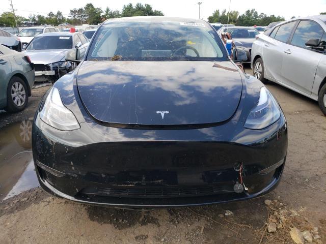 Photo 5 from auction – 2023 TESLA MODEL Y with VIN 7SAYGAEE8PF959024