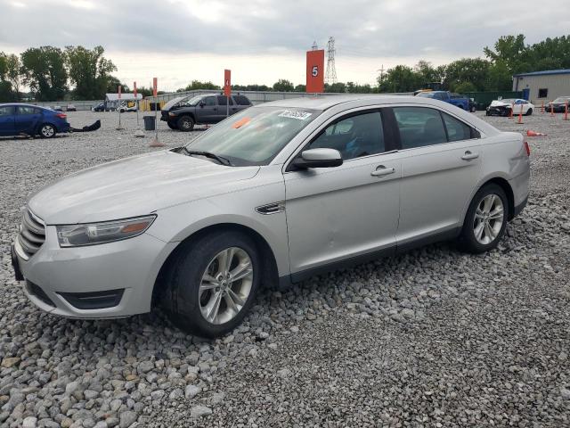 FORD TAURUS SEL 2014 with VIN 1FAHP2E8XEG106923 - Photo from auction