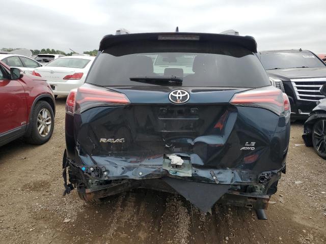 Photo 6 from auction – 2018 TOYOTA RAV4 LE with VIN 2T3BFREV3JW760405