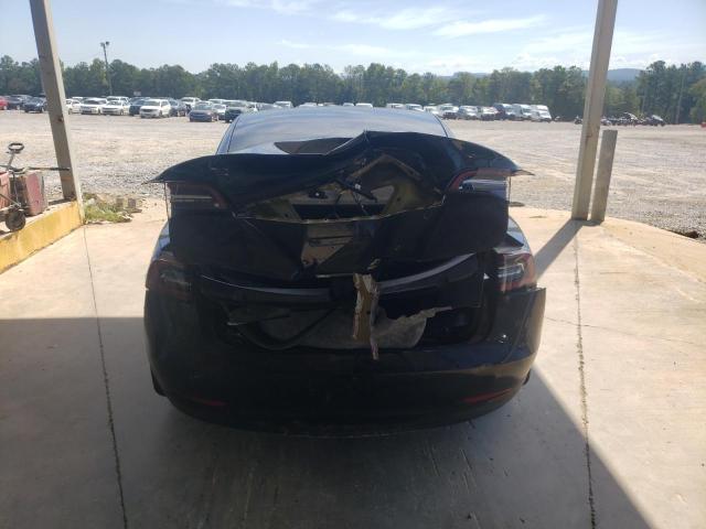 Photo 6 from auction – 2021 TESLA MODEL 3 with VIN 5YJ3E1EA3MF089558