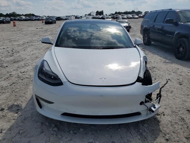 Photo 5 from auction – 2022 TESLA MODEL 3 with VIN 5YJ3E1EB0NF104947