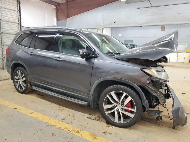 Photo 4 from auction – 2016 HONDA PILOT ELIT with VIN 5FNYF6H01GB044190