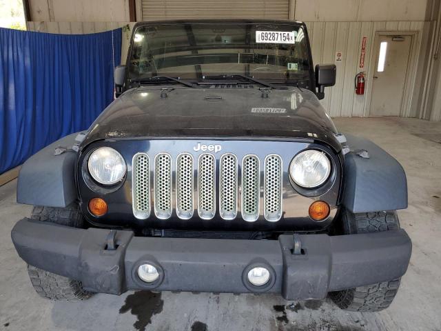 Photo 5 from auction – 2013 JEEP WRANGLER U with VIN 1C4BJWDG7DL701297