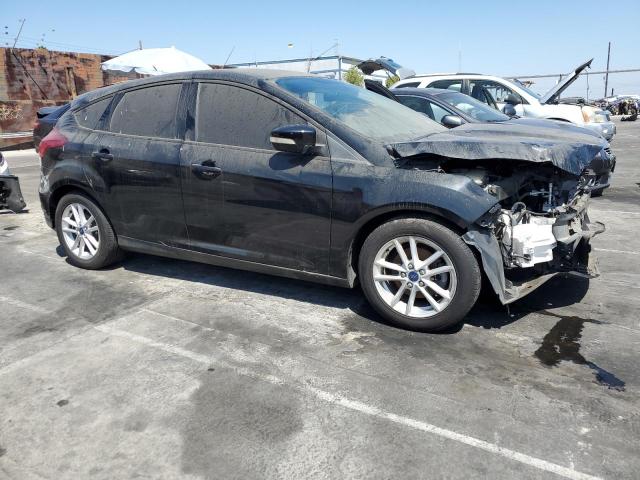 Photo 4 from auction – 2015 FORD FOCUS SE with VIN 1FADP3K2XFL383343