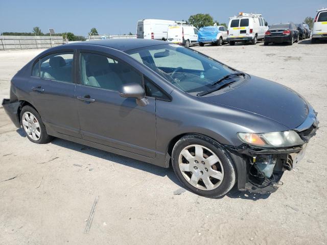 Photo 4 from auction – 2011 HONDA CIVIC LX with VIN 19XFA1F53BE030670