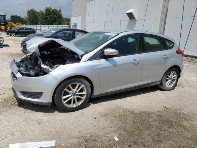 FORD FOCUS 2015 with VIN 1FADP3K21FL318784 - Photo from auction