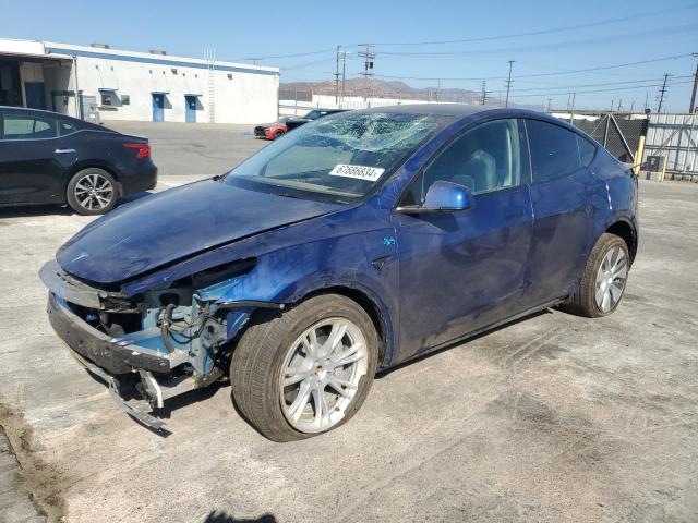 TESLA MODEL Y 2024 with VIN 7SAYGDEE7RA219031 - Photo from auction
