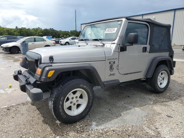 JEEP WRANGLER / 2002 with VIN 1J4FA39S92P722682 - Photo from auction