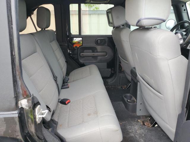 Photo 11 from auction – 2009 JEEP WRANGLER U with VIN 1J8GA69129L711746